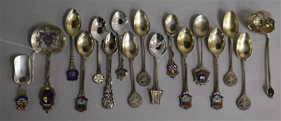 Seventeen assorted silver and plated Continental enamelled souvenir spoons.